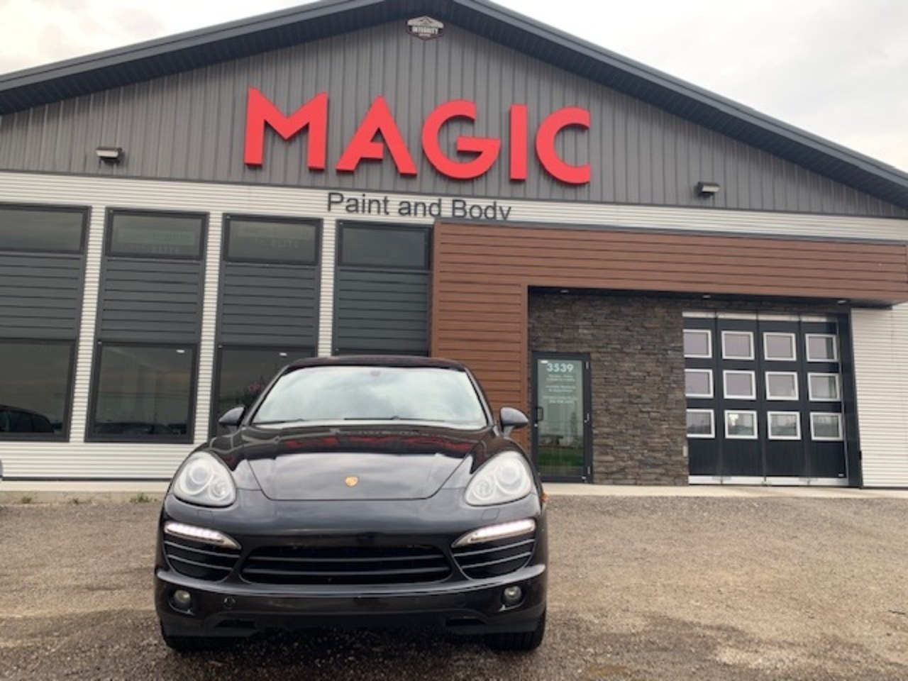 Porsche Cayenne completed and parked at the shop
